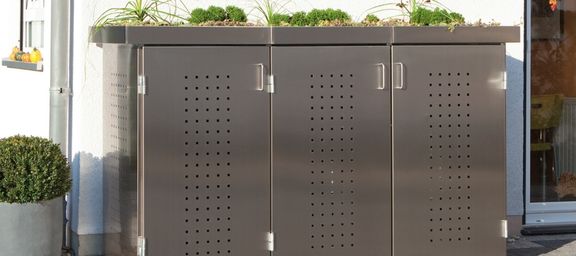 Mülltonnenbox aus Metall. Bei Ziller Nürnberg, der fränkischen Metropolregion in Bayern.